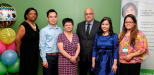 Case Manager Michelle Gordon, Valedictorian Aaron Antonio, RN, CARE Centre Executive Director Dr. Ruth Lee, Alexander Bezzina, Deputy Minister, Ontario Ministry of Citizenship and Immigration, 2015 IEN of the Year Kareen Tacderas, RN, and Case Manager Lourdes Vicente. 