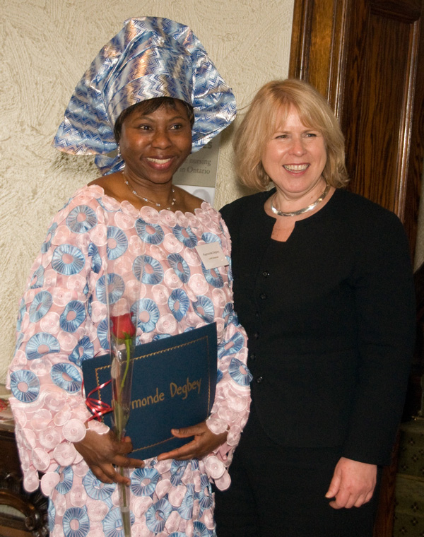 Degbey with Minister of Health and Long-term Care Deb Matthews